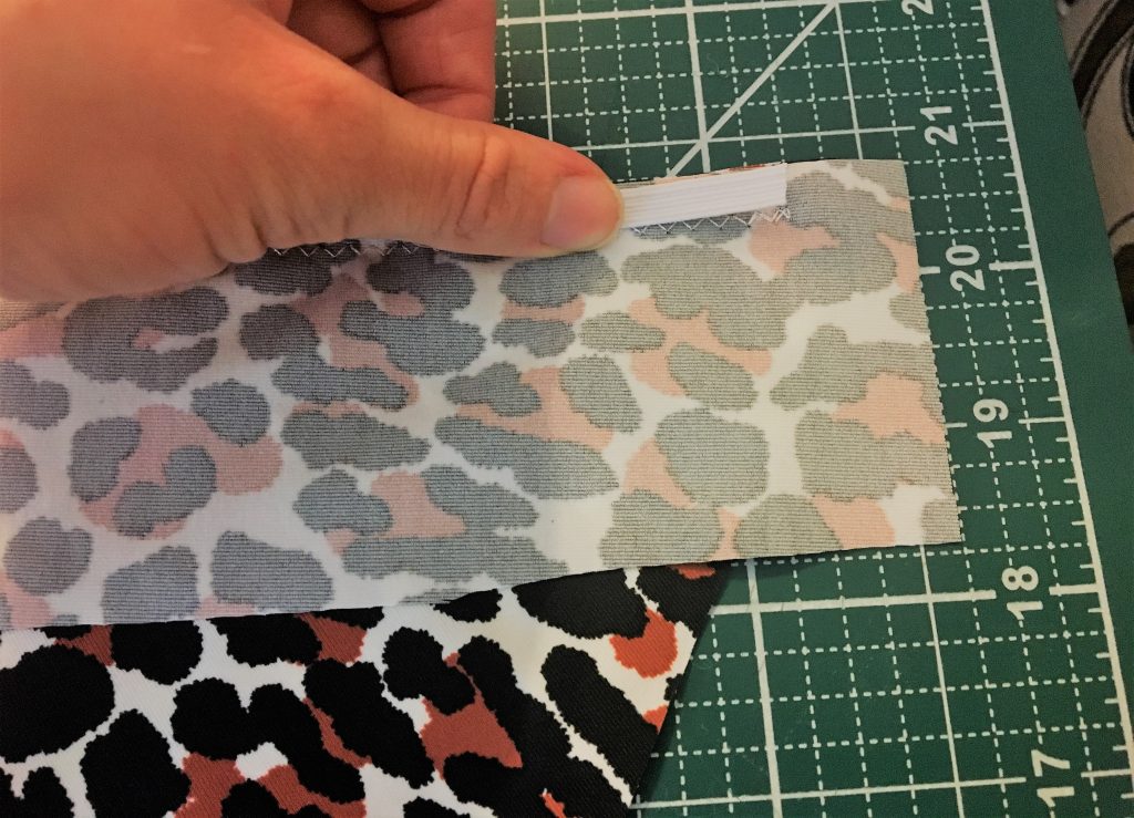 Sewing elastic and strap to leopard top