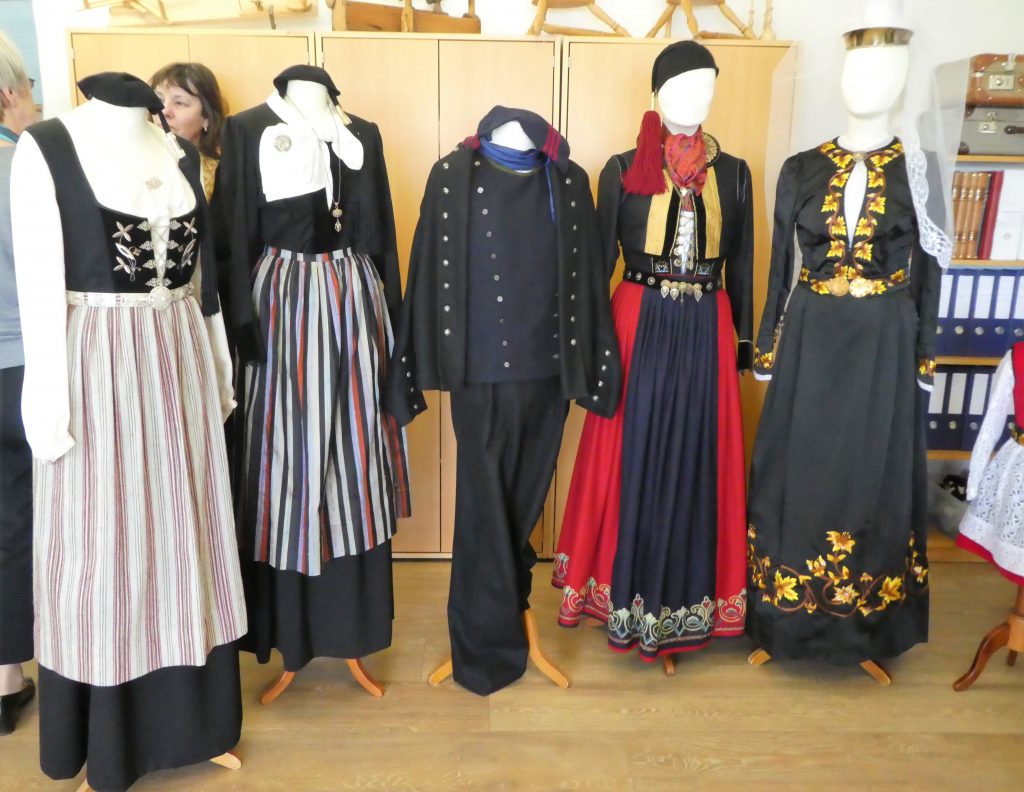 display of five mannequins dressed in different traditional Icelandic clothing
