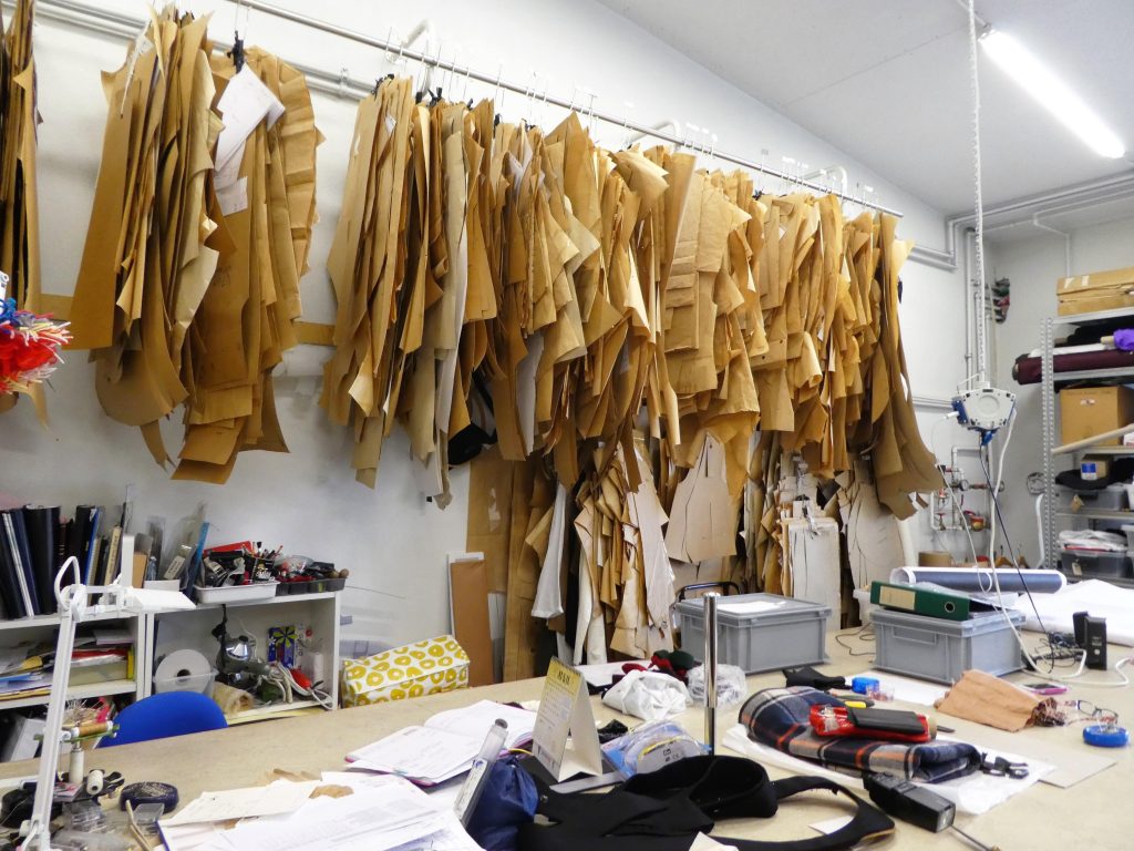 patterns for traditional Icelandic costumes hung up in a work room